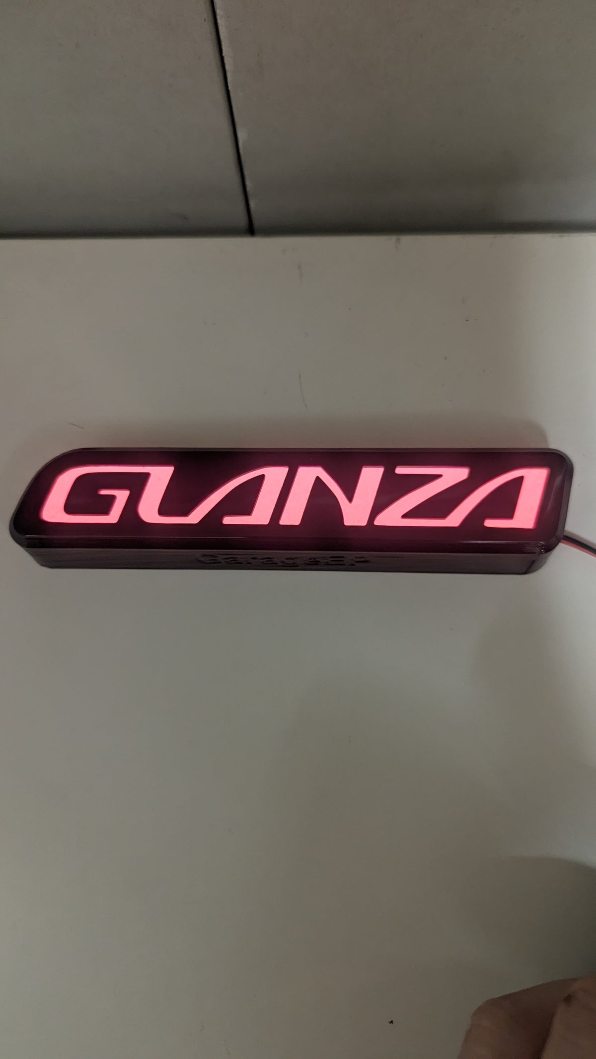 Pre-Facelift Bumper Red Illuminated Glanza Badge